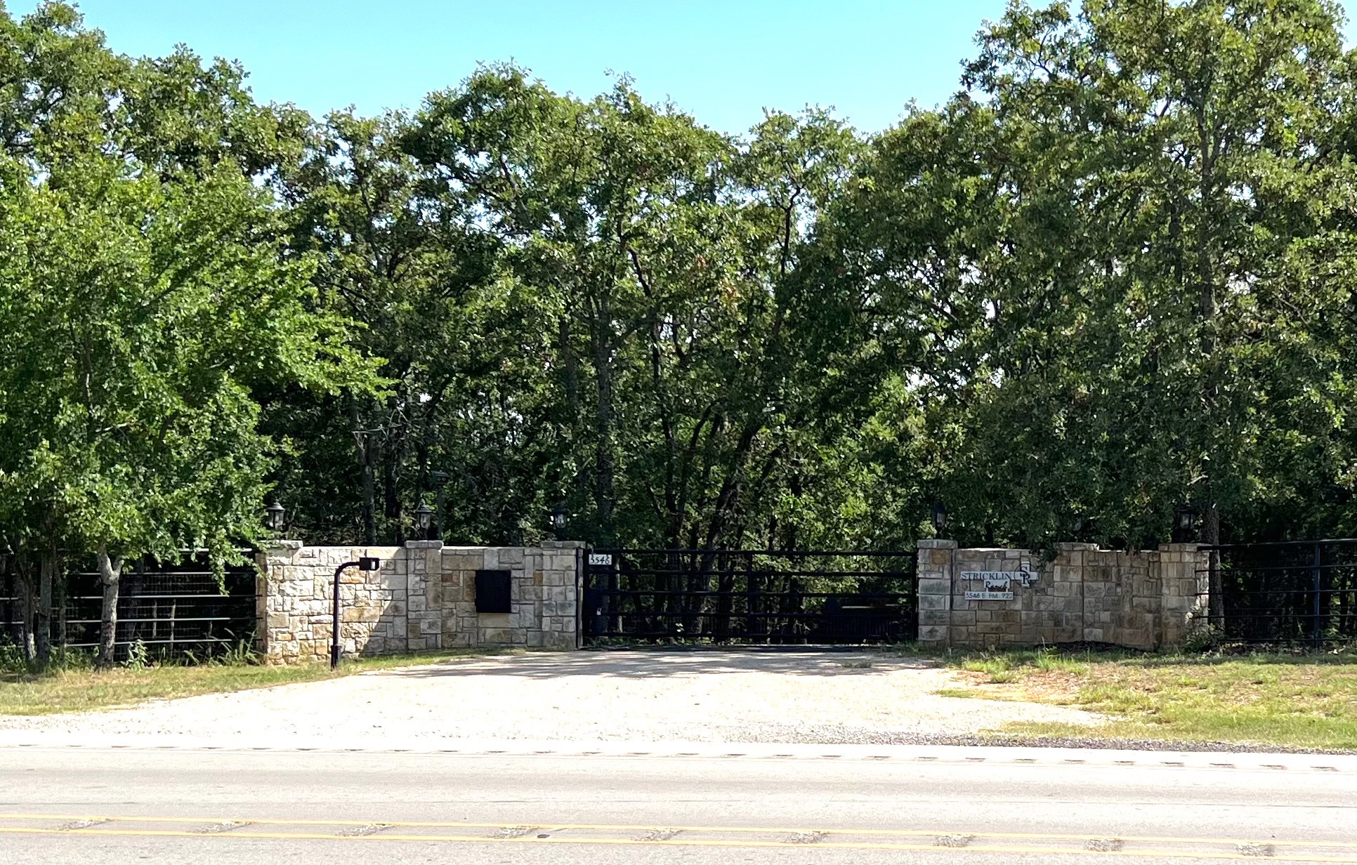 Stone entrance and gate at Stricklin Ranch